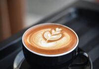 close up of coffee cup on table