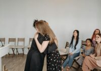 women hugging each other