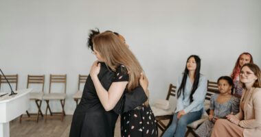 women hugging each other